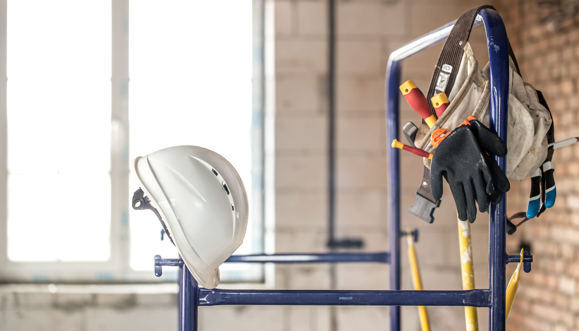 Working construction tool. Builder's accessories. House and house renovation concept.